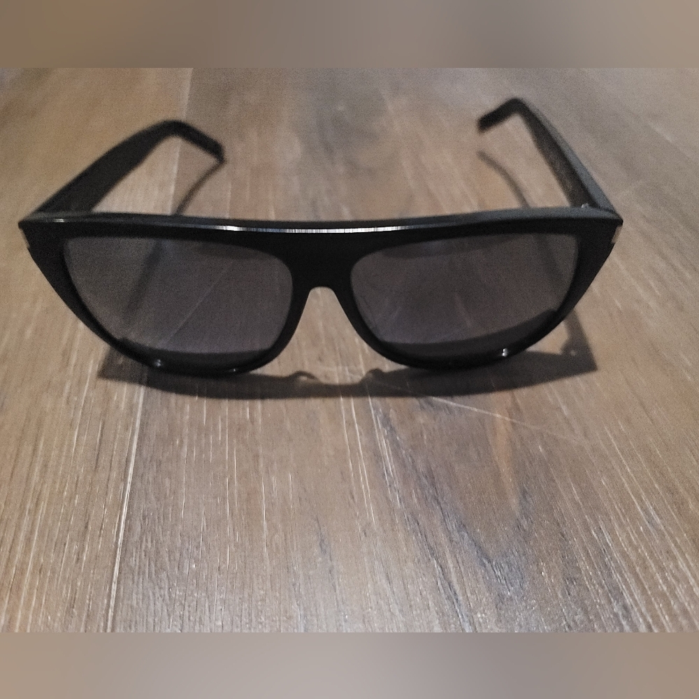 Saint Laurent black women's sunglasses, mirrored lenses.